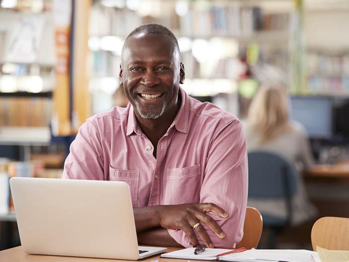 mature man on laptop